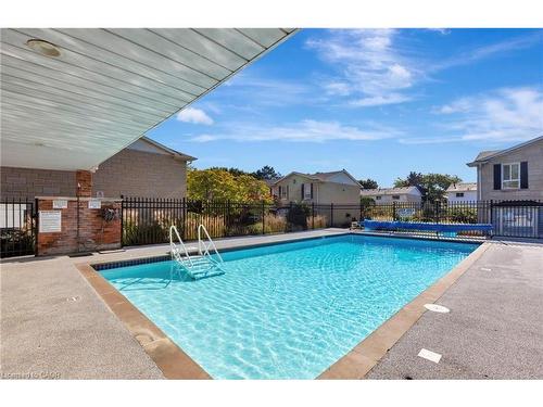 19-5475 Lakeshore Road, Burlington, ON - Outdoor With In Ground Pool