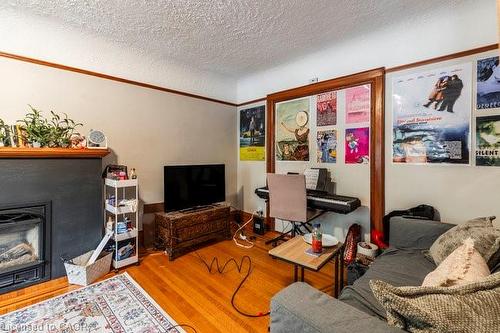 27 Dromore Crescent, Hamilton, ON - Indoor Photo Showing Living Room With Fireplace
