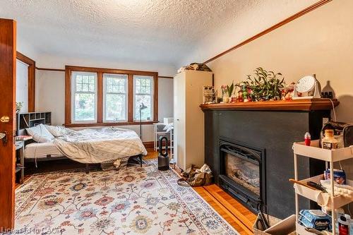 27 Dromore Crescent, Hamilton, ON - Indoor Photo Showing Bedroom With Fireplace