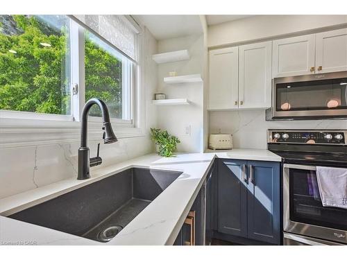2-2920 Headon Forest Drive, Burlington, ON - Indoor Photo Showing Kitchen With Stainless Steel Kitchen With Upgraded Kitchen