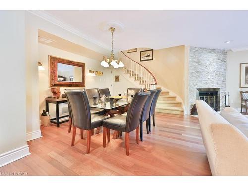 68 Tradewind Drive, Oakville, ON - Indoor Photo Showing Dining Room With Fireplace