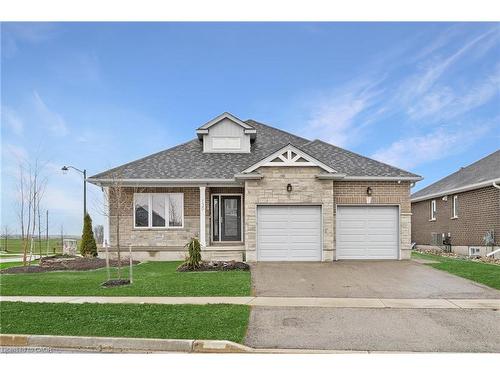 130 Stephenson Way, Minto, ON - Outdoor With Facade