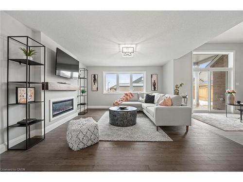 130 Stephenson Way, Minto, ON - Indoor Photo Showing Living Room With Fireplace