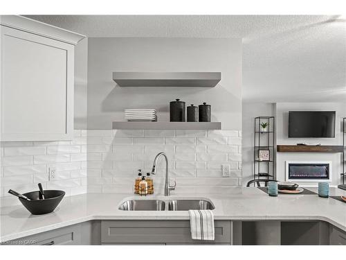 130 Stephenson Way, Minto, ON - Indoor Photo Showing Kitchen With Double Sink With Upgraded Kitchen