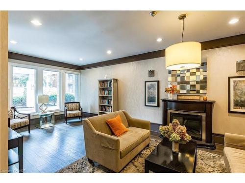 304 (3D)-67 Caroline Street S, Hamilton, ON - Indoor Photo Showing Living Room With Fireplace
