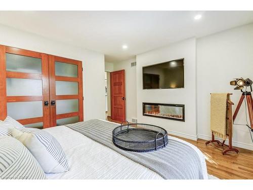 9 Foresthill Crescent, Fonthill, ON - Indoor Photo Showing Bedroom With Fireplace