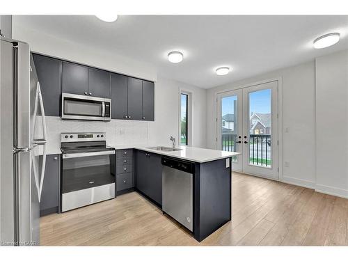 53-99 Roger Street, Waterloo, ON - Indoor Photo Showing Kitchen With Double Sink