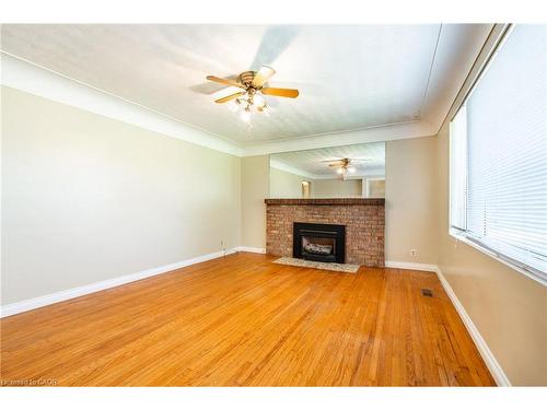 699 Rymal Road W, Hamilton, ON - Indoor Photo Showing Living Room With Fireplace