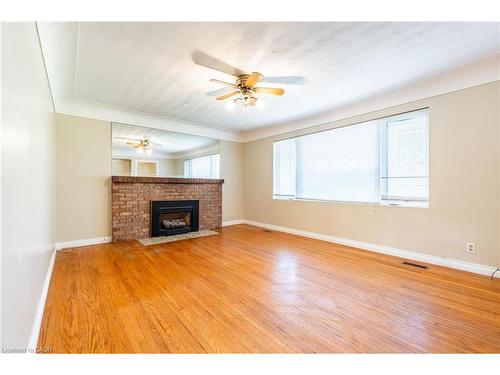 699 Rymal Road W, Hamilton, ON - Indoor Photo Showing Living Room With Fireplace