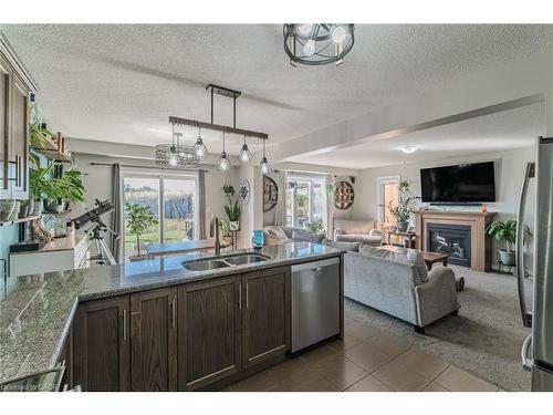 1384 Caen Avenue, Woodstock, ON - Indoor With Fireplace