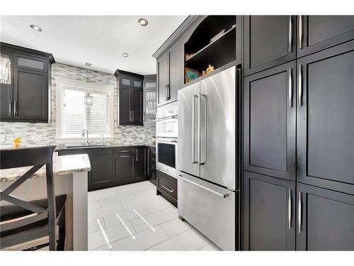 107 Forbes Crescent, Listowel, ON - Indoor Photo Showing Kitchen With Upgraded Kitchen