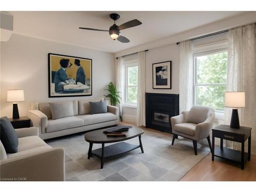 491 Pettit Trail, Milton, ON - Indoor Photo Showing Living Room With Fireplace