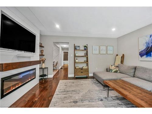 A-174 Kings Forest Drive, Hamilton, ON - Indoor Photo Showing Living Room With Fireplace