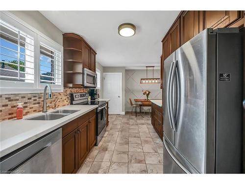 A-174 Kings Forest Drive, Hamilton, ON - Indoor Photo Showing Kitchen With Double Sink