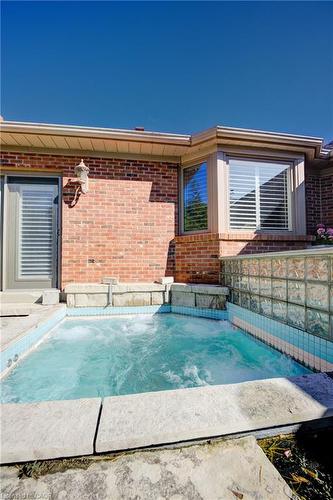 592 Manorwood Court, Waterloo, ON - Outdoor With In Ground Pool