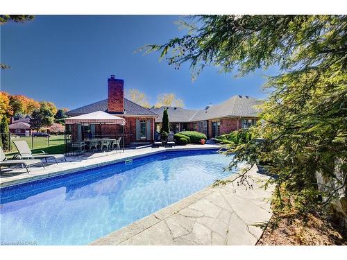 592 Manorwood Court, Waterloo, ON - Outdoor With In Ground Pool