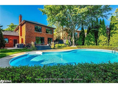 1319 Greeneagle Drive, Oakville, ON - Outdoor With In Ground Pool