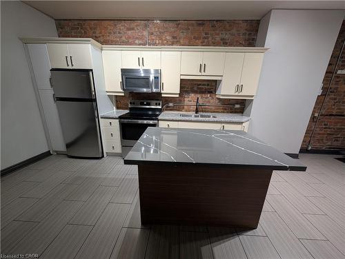 B-473 King Street W, Hamilton, ON - Indoor Photo Showing Kitchen With Double Sink