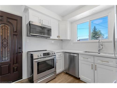 879 Upper Sherman Avenue, Hamilton, ON - Indoor Photo Showing Kitchen With Double Sink