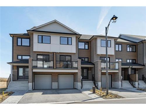 7-182 Bridge Crescent, Minto, ON - Outdoor With Balcony With Facade