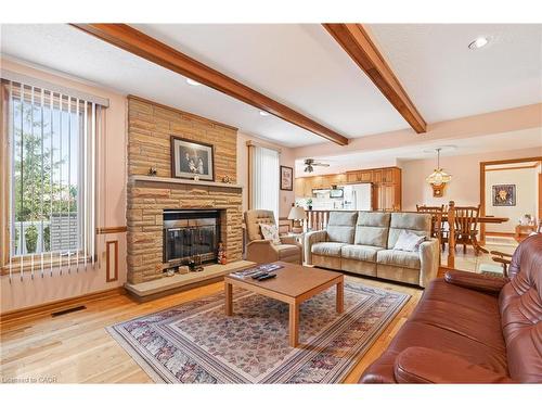 79 Maple Drive, Hamilton, ON - Indoor Photo Showing Living Room With Fireplace