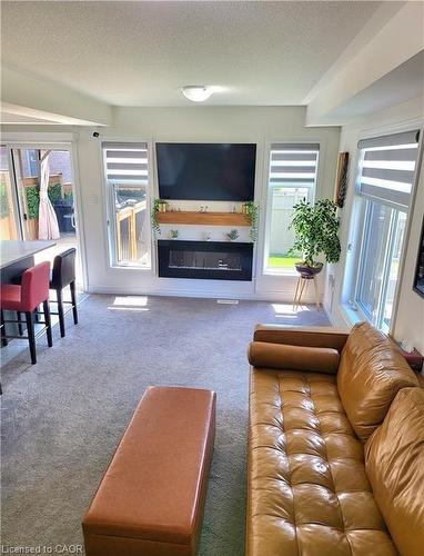 3098 Michelangelo Road, Burlington, ON - Indoor Photo Showing Living Room With Fireplace