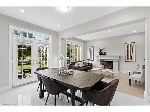 5095 Preservation Circle, Mississauga, ON - Indoor Photo Showing Dining Room With Fireplace