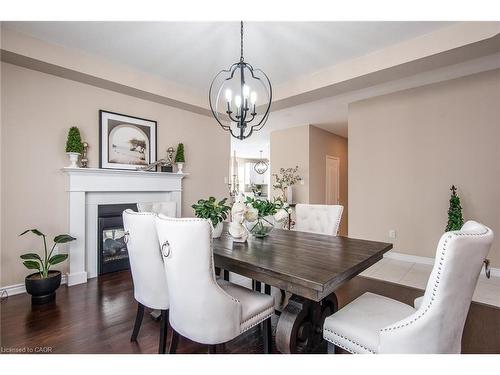 232 Shady Glen Crescent, Kitchener, ON - Indoor Photo Showing Dining Room With Fireplace