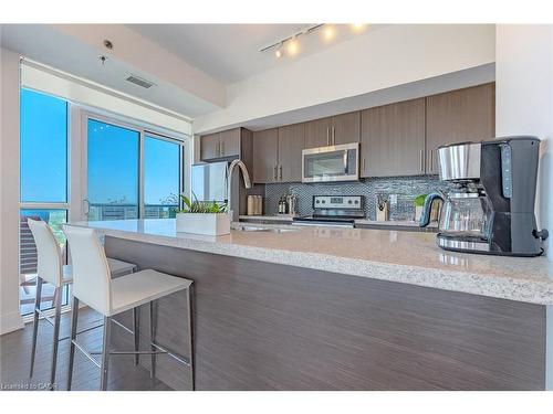 1603-55 Speers Road, Oakville, ON - Indoor Photo Showing Kitchen With Stainless Steel Kitchen