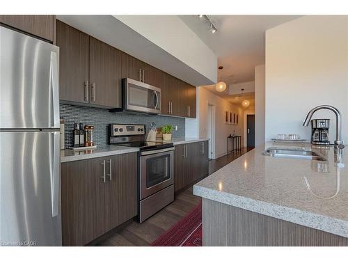 1603-55 Speers Road, Oakville, ON - Indoor Photo Showing Kitchen With Stainless Steel Kitchen With Double Sink
