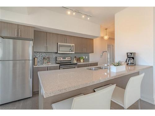 1603-55 Speers Road, Oakville, ON - Indoor Photo Showing Kitchen With Stainless Steel Kitchen With Double Sink