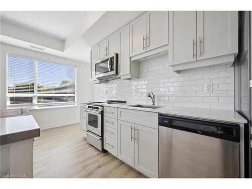 202-247 Northfield Drive E, Waterloo, ON - Indoor Photo Showing Kitchen With Upgraded Kitchen