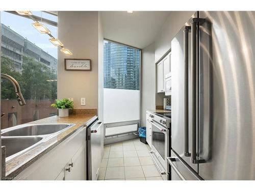 201-81 Navy Wharf Court, Toronto, ON - Indoor Photo Showing Kitchen With Double Sink
