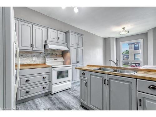 26 Madison Avenue, Hamilton, ON - Indoor Photo Showing Kitchen With Double Sink