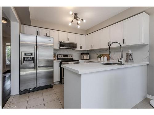 3356 Mikalda Road, Burlington, ON - Indoor Photo Showing Kitchen With Stainless Steel Kitchen With Double Sink