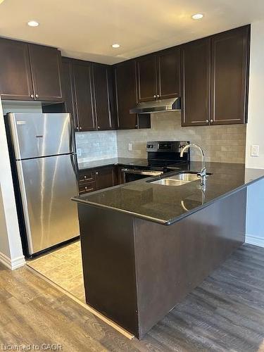 211-5327 Upper Middle Road, Burlington, ON - Indoor Photo Showing Kitchen With Double Sink