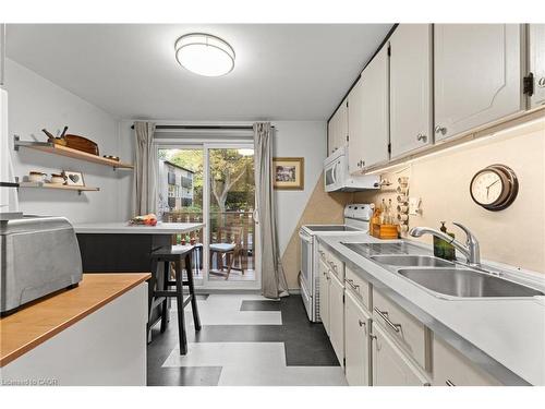 7-1967 Main Street W, Hamilton, ON - Indoor Photo Showing Kitchen With Double Sink