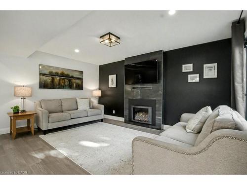 166 Westvale Drive, Waterloo, ON - Indoor Photo Showing Living Room With Fireplace