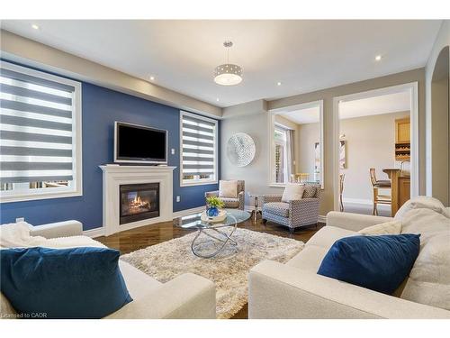 317 Great Lakes Boulevard, Oakville, ON - Indoor Photo Showing Living Room With Fireplace