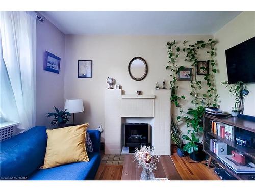 156 Park Row S, Hamilton, ON - Indoor With Fireplace