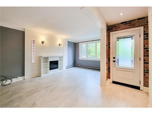 156 Park Row S, Hamilton, ON - Indoor Photo Showing Other Room With Fireplace