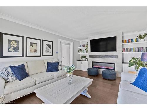94 Dorchester Drive, Grimsby, ON - Indoor Photo Showing Living Room With Fireplace