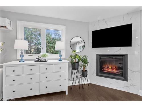 94 Dorchester Drive, Grimsby, ON - Indoor Photo Showing Living Room With Fireplace