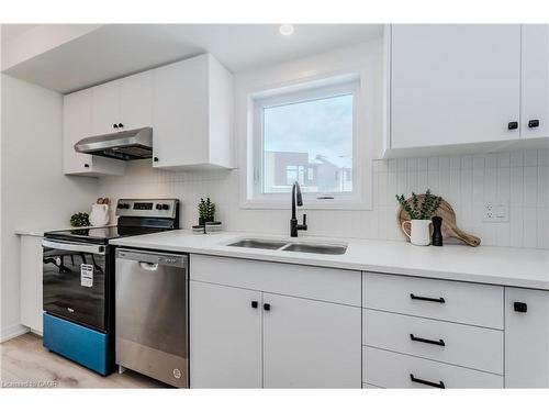 A4-15 Stauffer Woods Trail, Kitchener, ON - Indoor Photo Showing Kitchen With Double Sink