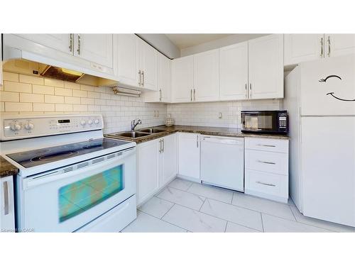 43-1155 Paramount Drive, Stoney Creek, ON - Indoor Photo Showing Kitchen With Double Sink
