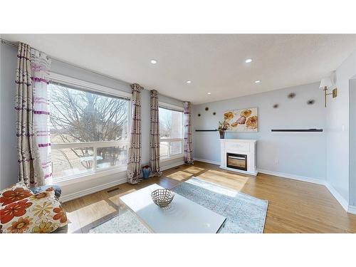 43-1155 Paramount Drive, Stoney Creek, ON - Indoor Photo Showing Living Room With Fireplace