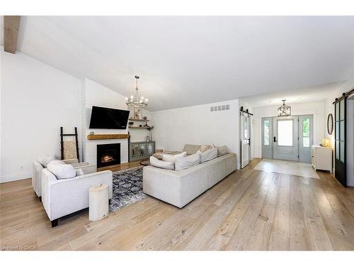 2560 2 Side Road, Burlington, ON - Indoor Photo Showing Living Room With Fireplace
