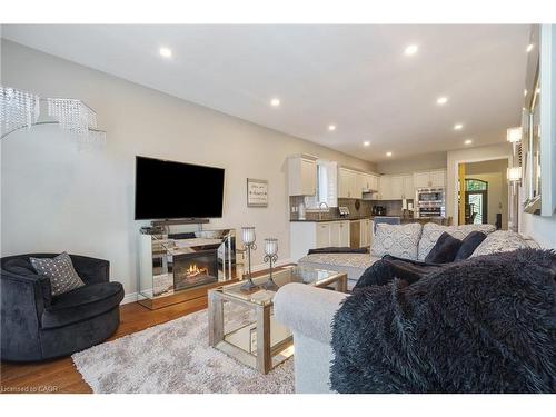 21 Shade Forest Trail, Hamilton, ON - Indoor Photo Showing Living Room With Fireplace