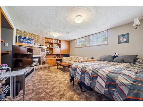 162 The Country Way, Kitchener, ON - Indoor Photo Showing Bedroom With Fireplace