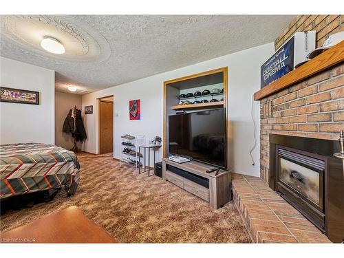 162 The Country Way, Kitchener, ON - Indoor With Fireplace